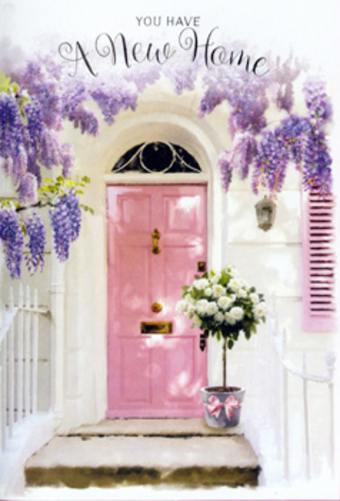 The photograph portrays a charming front doorway in Gants Hill that feels like a love letter to fresh starts and gentle celebrations. At its heart is a pale pink front door, its surface smooth and softly reflective, catching the ambient daylight that drifts through the street. The door is framed by a cascade of lavender wisteria, heavy with bloom and draped in long, trailing clusters. The blossoms range from soft lilac to deeper lavender, creating a curtain of colour that arches overhead and falls down the sides of the entrance, as if nature has dressed the home for a special occasion. The walls surrounding the door are whitewashed with a slightly chalky finish, giving a clean yet cosy backdrop; a single shutter, washed in a complementary pastel hue, hints at a peaceful, well-loved interior. On the step, just before the threshold, sits a rustic grey bucket filled to overflowing with creamy white roses. Each rose is full and rounded, layers of petals folding into one another like delicate fabric. Interwoven greenery adds a fresh, garden-picked feel, suggesting the bouquet could have come from a local plot off Eastern Avenue. A soft pink satin ribbon is tied neatly around the base of the bucket, its sheen catching the light and providing a romantic finishing flourish. The composition captures that tender moment when flowers are left at a new address-perhaps a surprise delivery to mark a move or first home. Everything about the scene-the pastel colours, the tumbling wisteria, the abundant roses-radiates welcome, reassurance, and the quiet thrill of beginning again in Gants Hill.